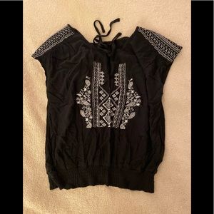 Sleeveless black blouse